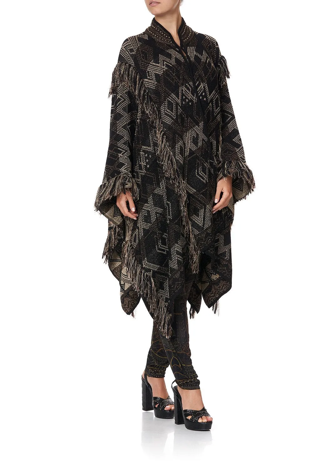 HIGH NECK KNIT JACQUARD PONCHO WITH TASSELS FLIGHT OF AMUN-RA